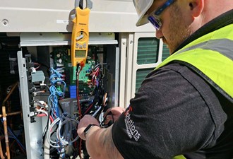 TF Solutions Colleague Working On Project